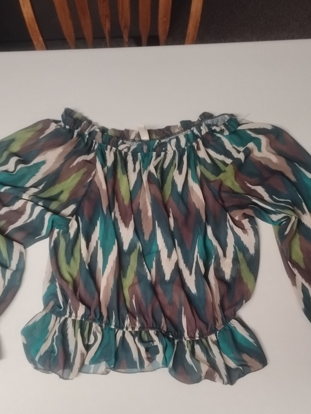 Off-Shoulder Ruffle-Hem Blouse in Teal Multi